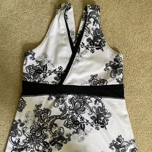 *WORN ONCE* 
Lululemon racer back black and white paisley tank top size 6